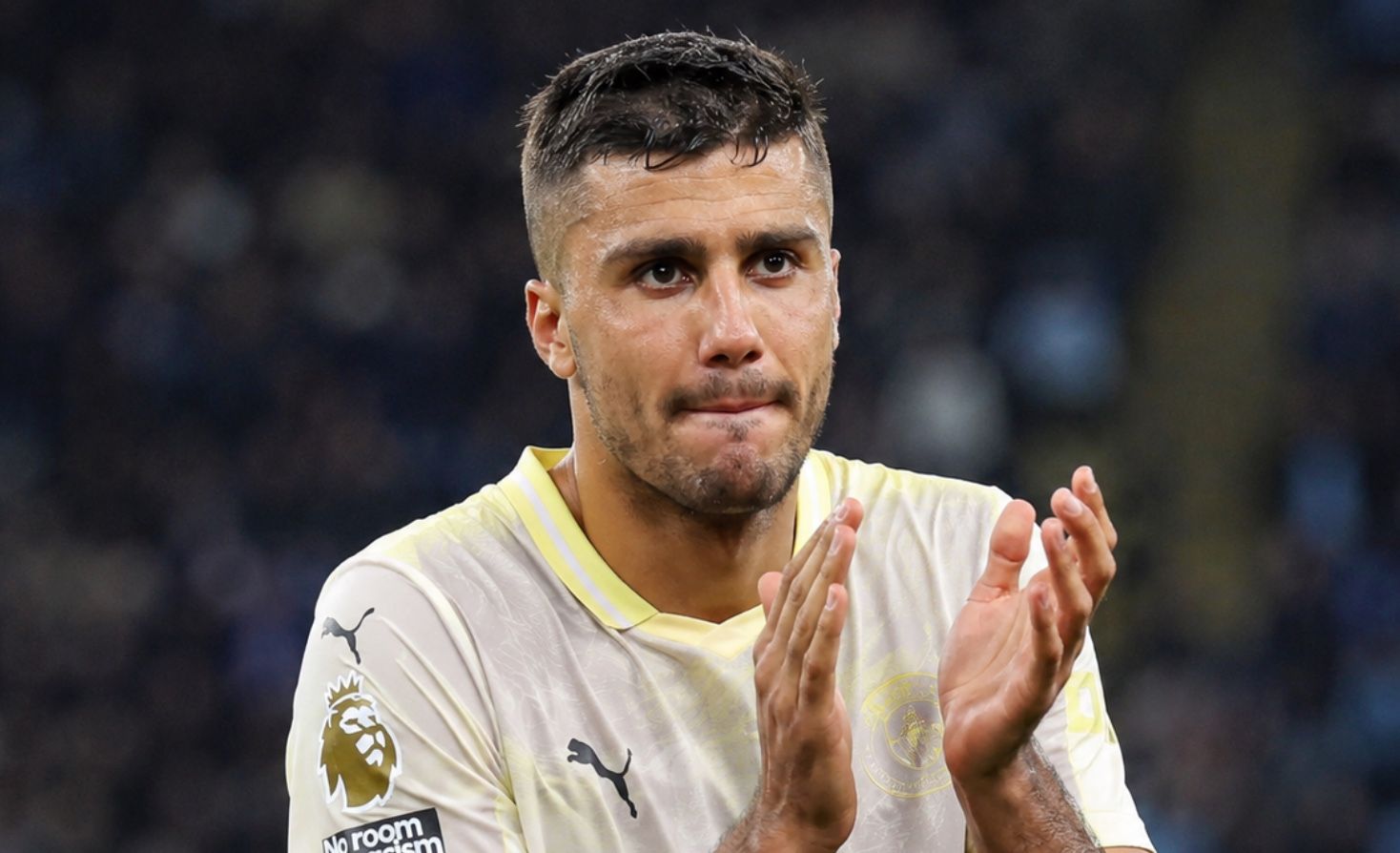 Manchester City midfielder Rodri in action during a match.