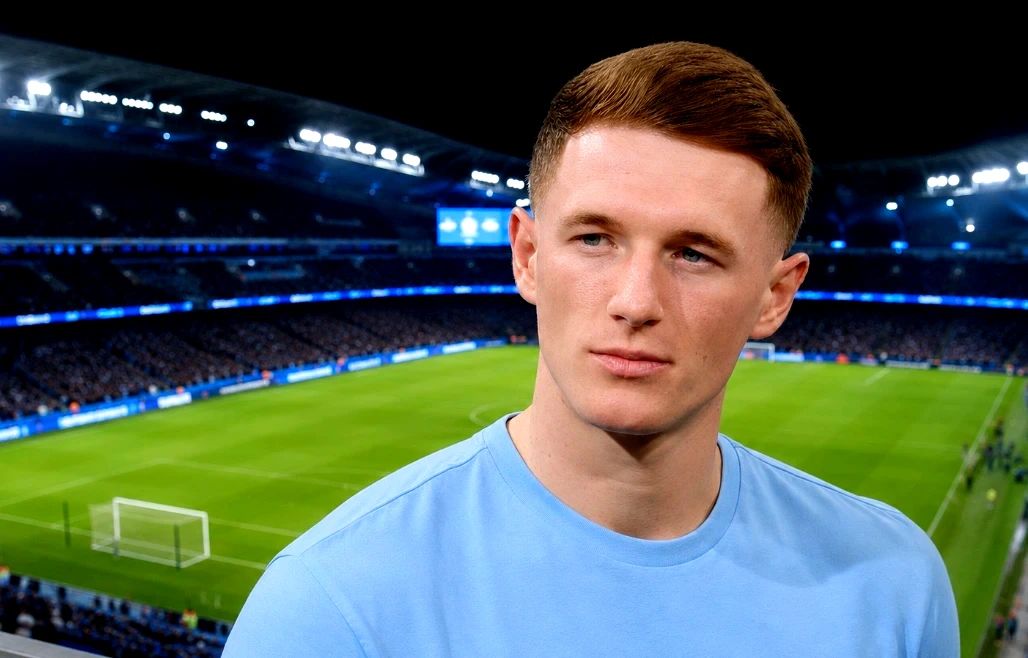 Elliot Anderson smiles during his first interview as a Manchester City player at the City Football Academy.